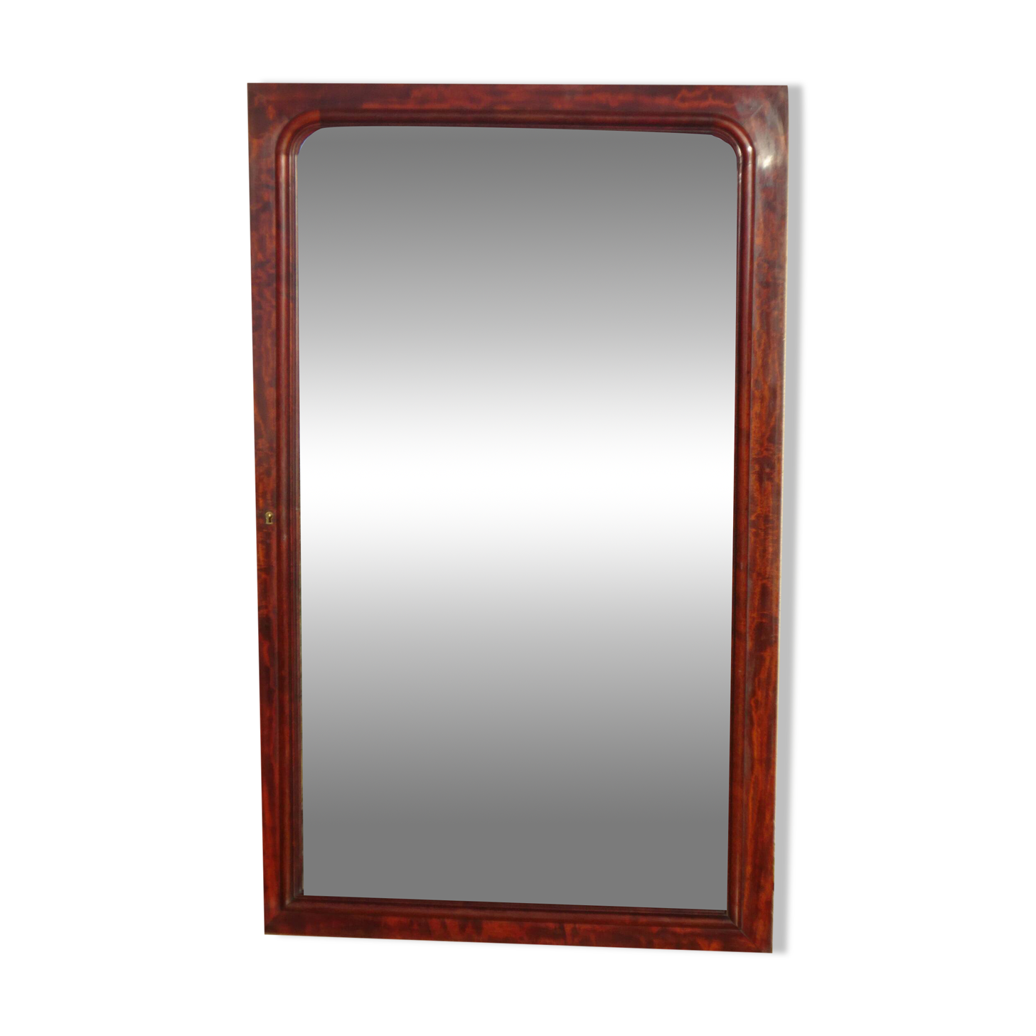 Large antique mirror in a flame mahogany frame; 132x82 cm