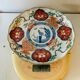 Imari porcelain plate from Japan, 19th century, hand-painted decoration.