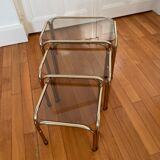 Pull-out tables in vintage smoked glass