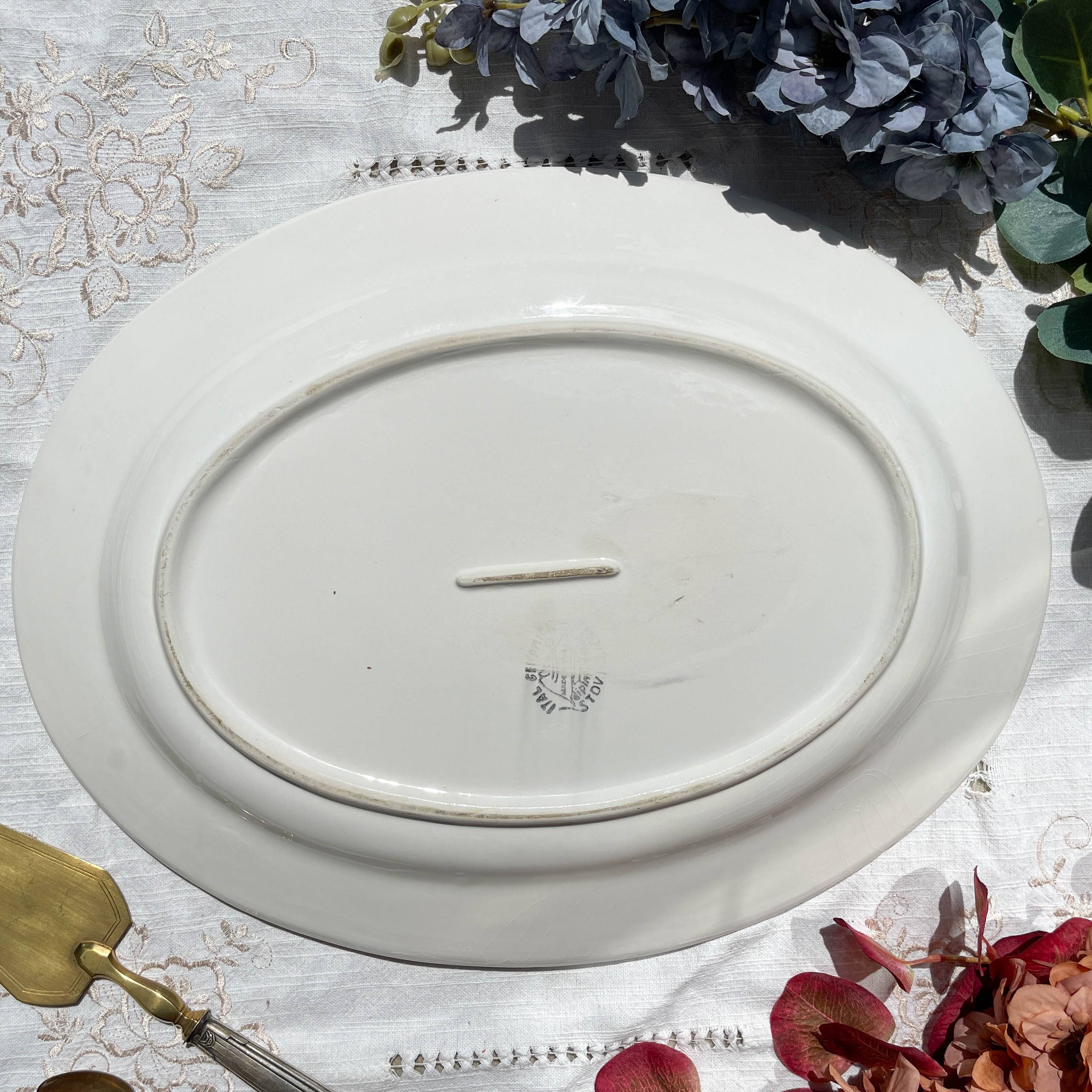 Large antique oval platter in Italian Stoviglierie earthenware – blue, green, and pink bird and flower motif