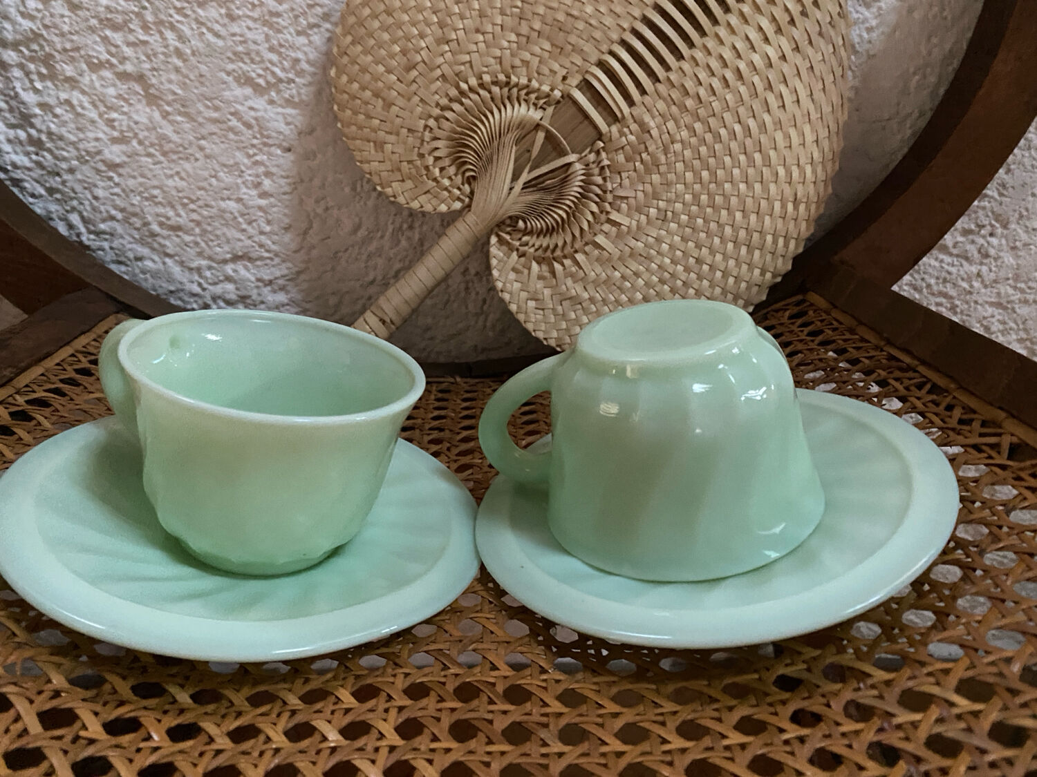 A pair of antique opaline coffee cups.