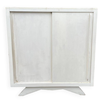 Vintage sideboard with sliding doors
