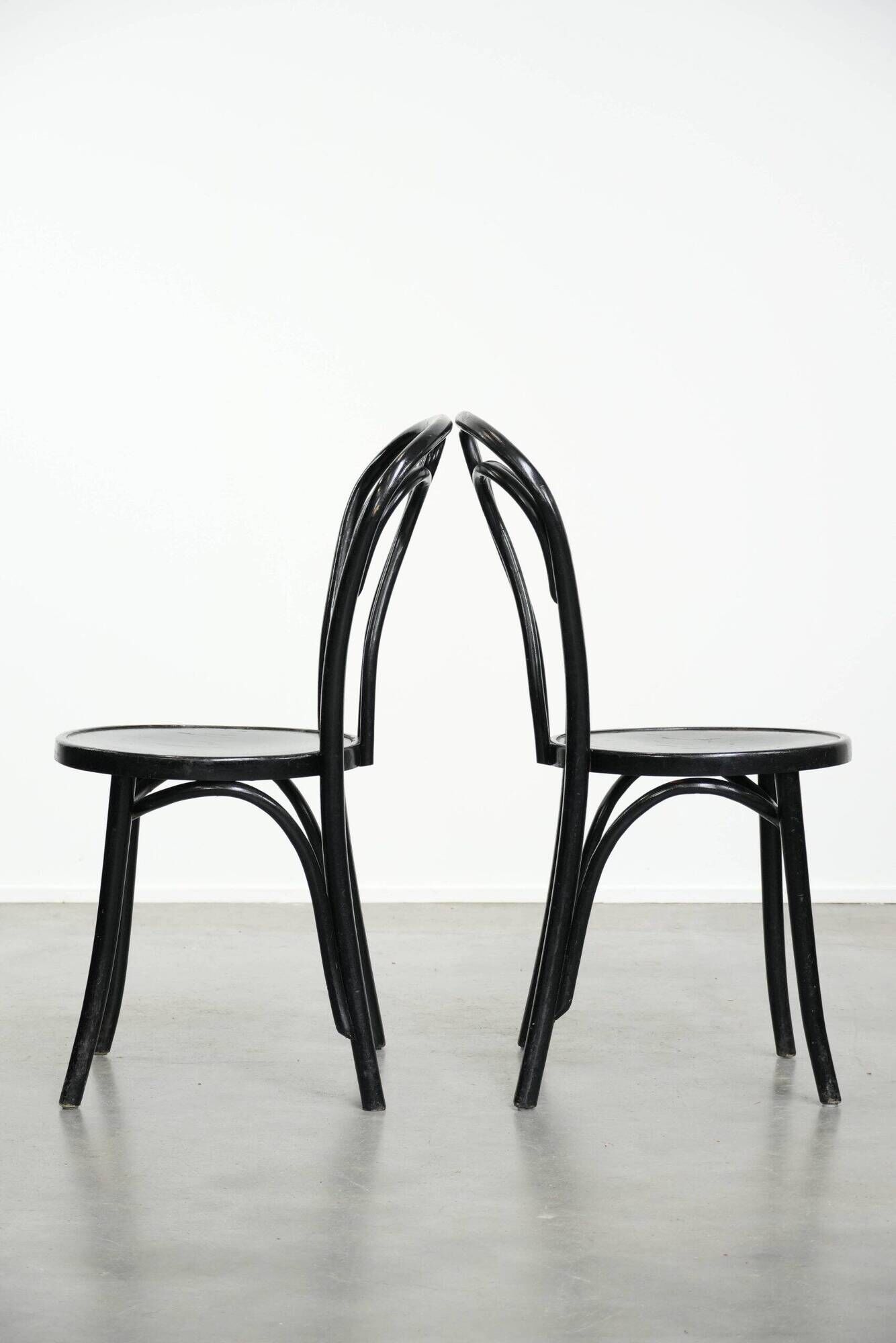 Set of 2 black vintage bistro chairs with an elegant design