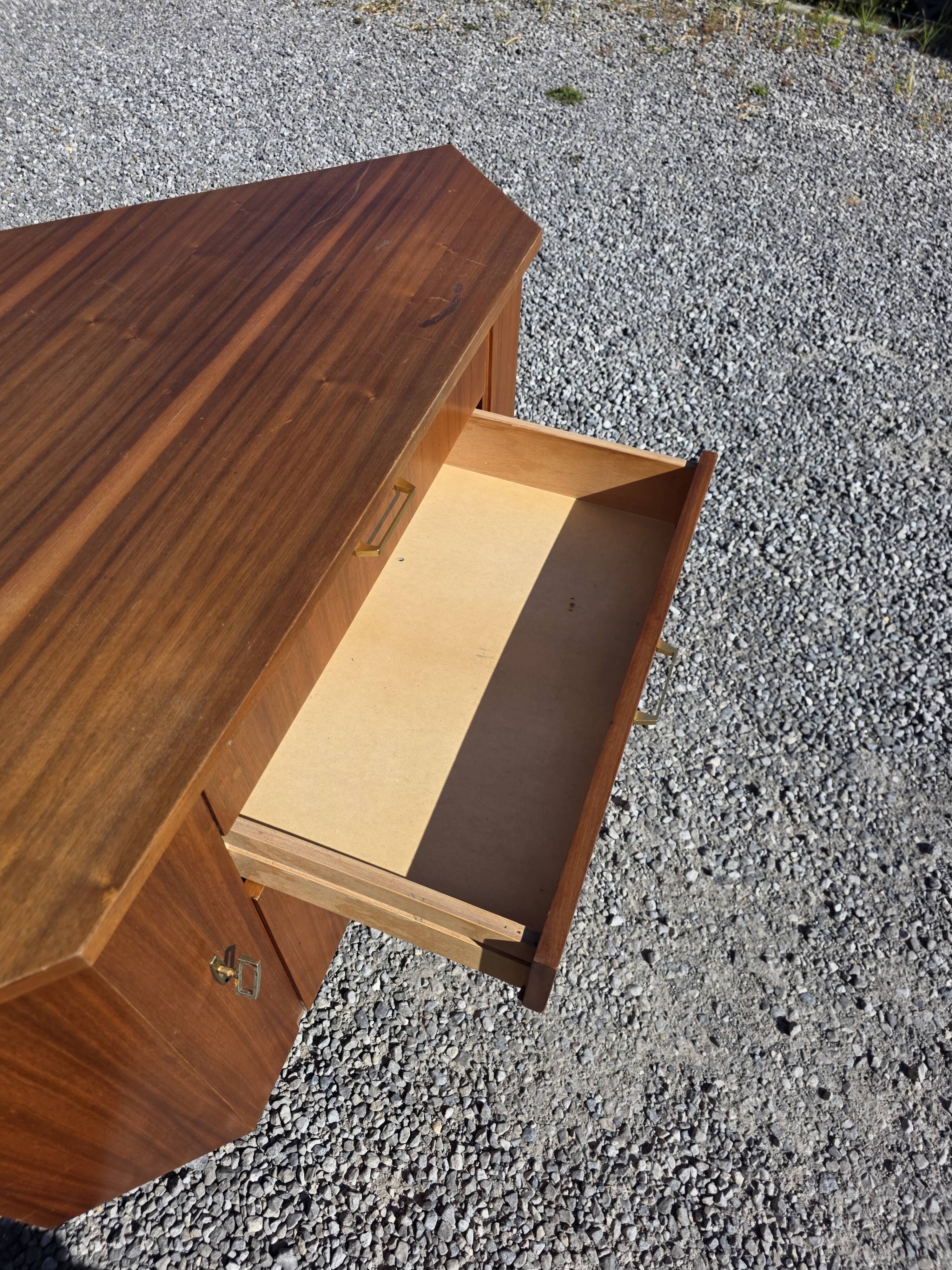 Scandinavian corner unit in teak from the 1960s.