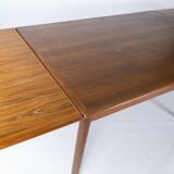 Dining table in teak with extensions of danish design from the 1960s