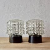 Old pair of molded glass and Bakelite wall or ceiling lights
