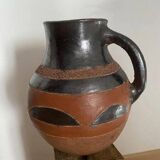 Terracotta vase with handle, partly glazed