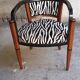 Art deco armchair with zebra tapestry
