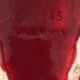 Ruby red ceramic pocket ashtray from Vallauris, numbered.
