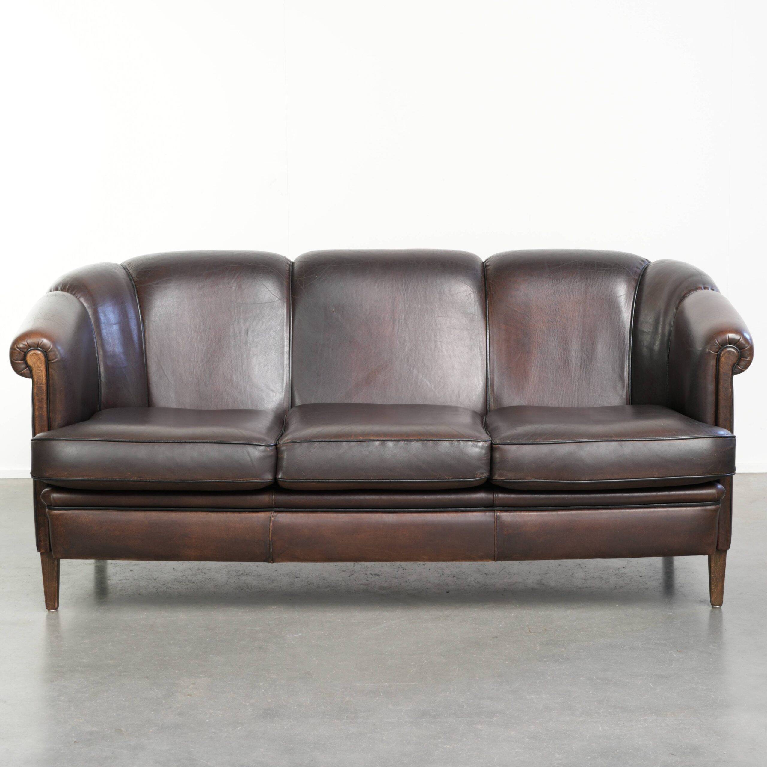 Unique sheepskin 3-seater sofa with deep colours and a distinctive design
