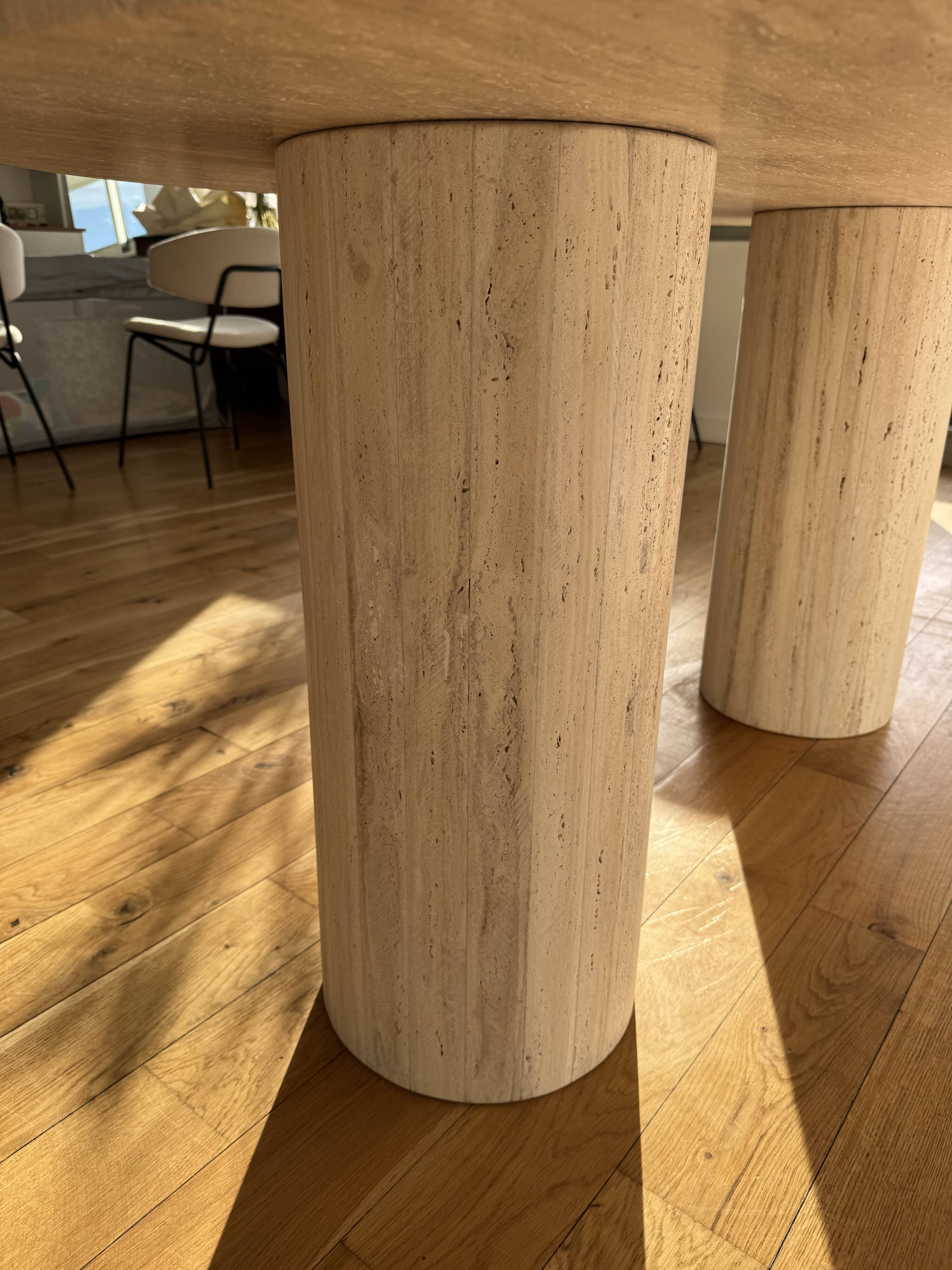 Dining table in natural travertine.