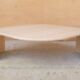 Table basse vintage en travertin par les éditions Roche Bobois