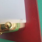 Four vintage gold wall lights with opaline globes on wooden support