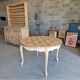 Round table made of cherry wood, sanded and varnished.