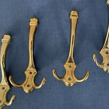 4 golden brass coat racks