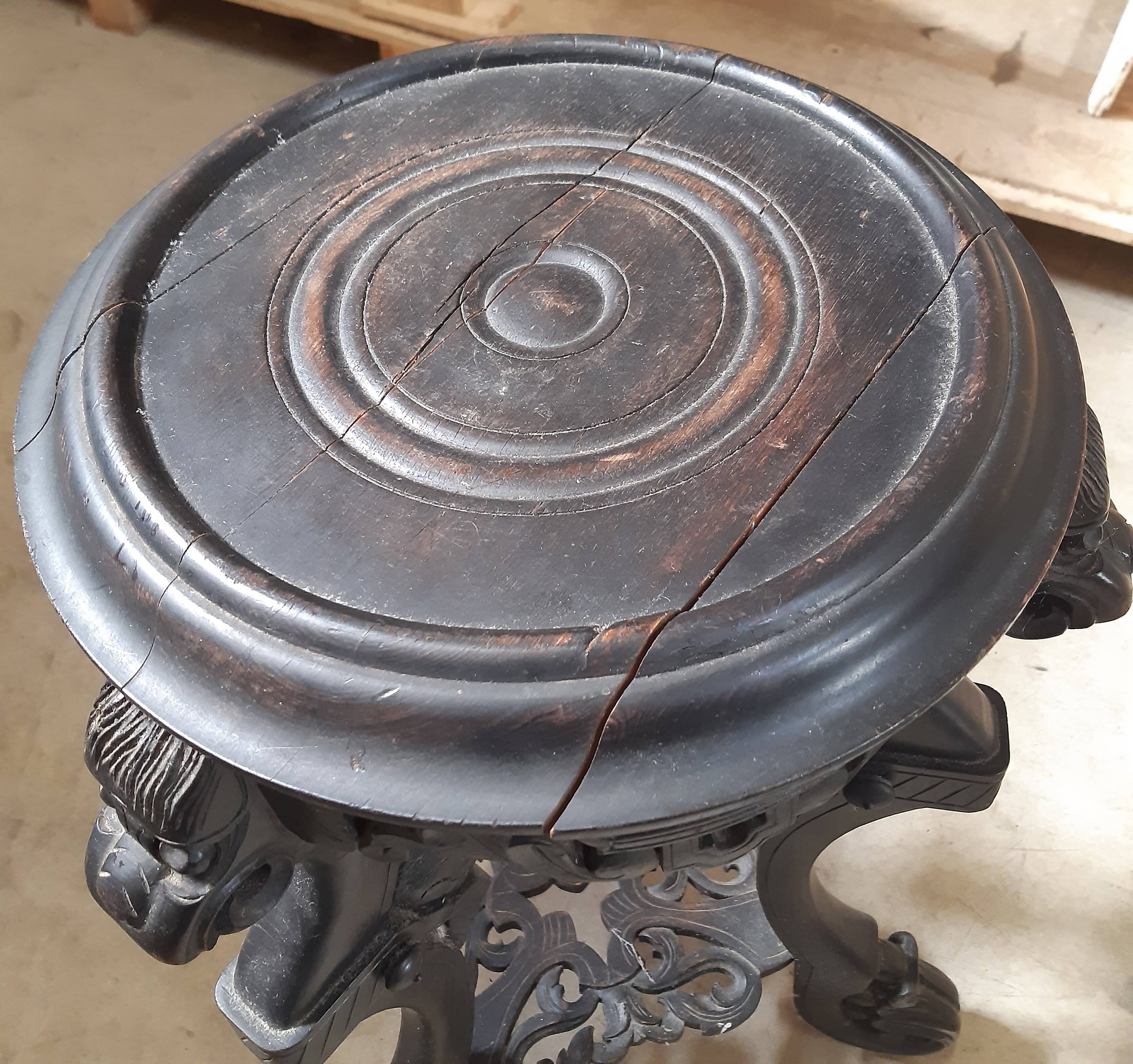 Antique carved side table with Indochinese inspiration, made of blackened wood