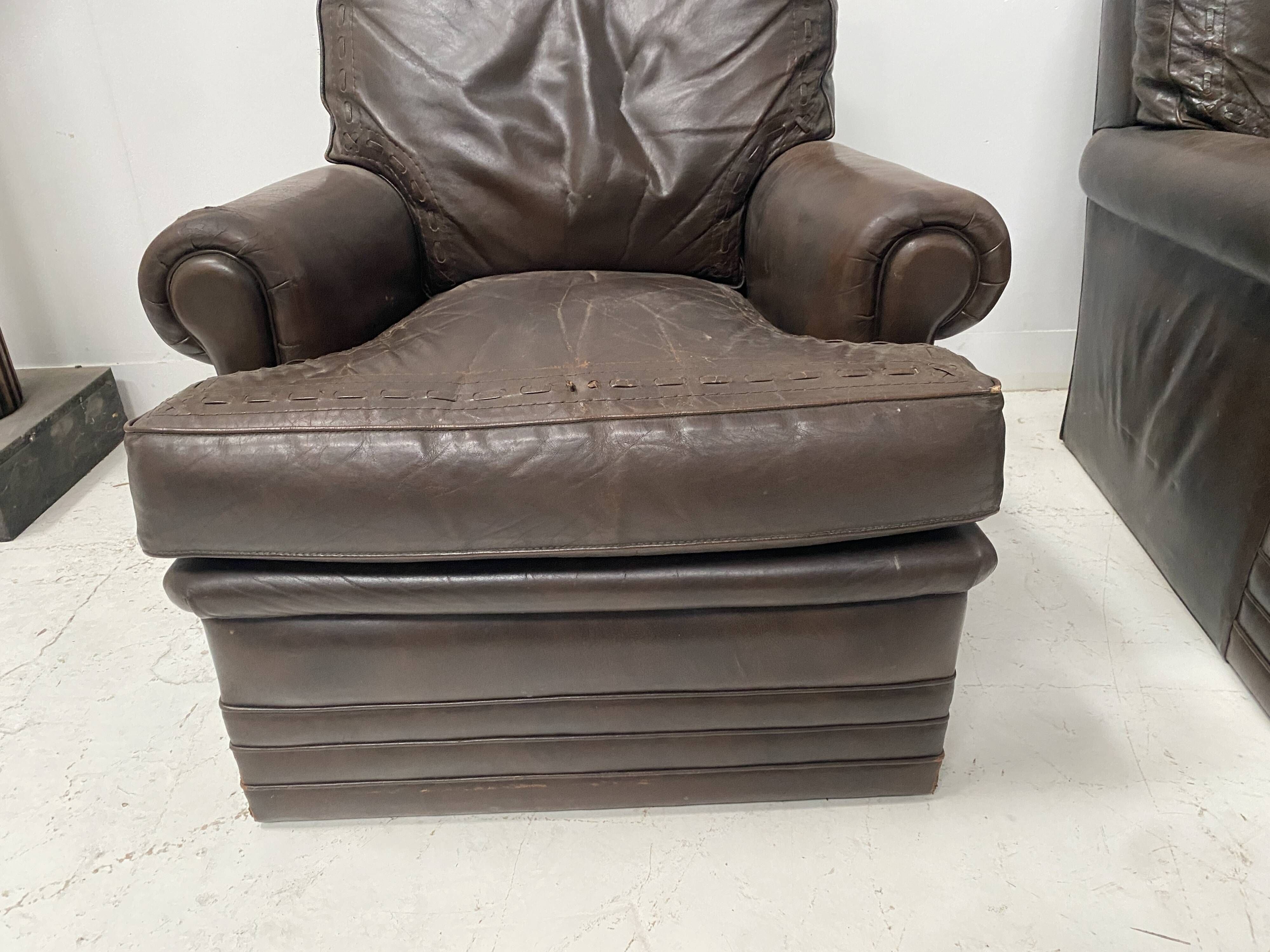 Pair of vintage brown leather armchairs from the 1970s.