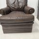 Pair of vintage brown leather armchairs from the 1970s.
