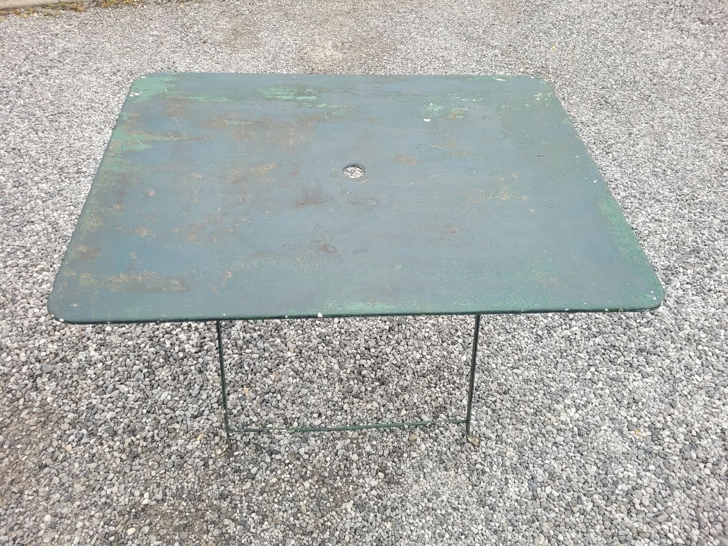 Old folding iron garden table