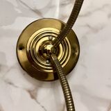 Articulated shell wall light