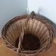 Woven wicker basket with handle