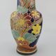 Large multicoloured ceramic vase with floral decoration signed NT.