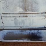 White ladle hangs with bowl