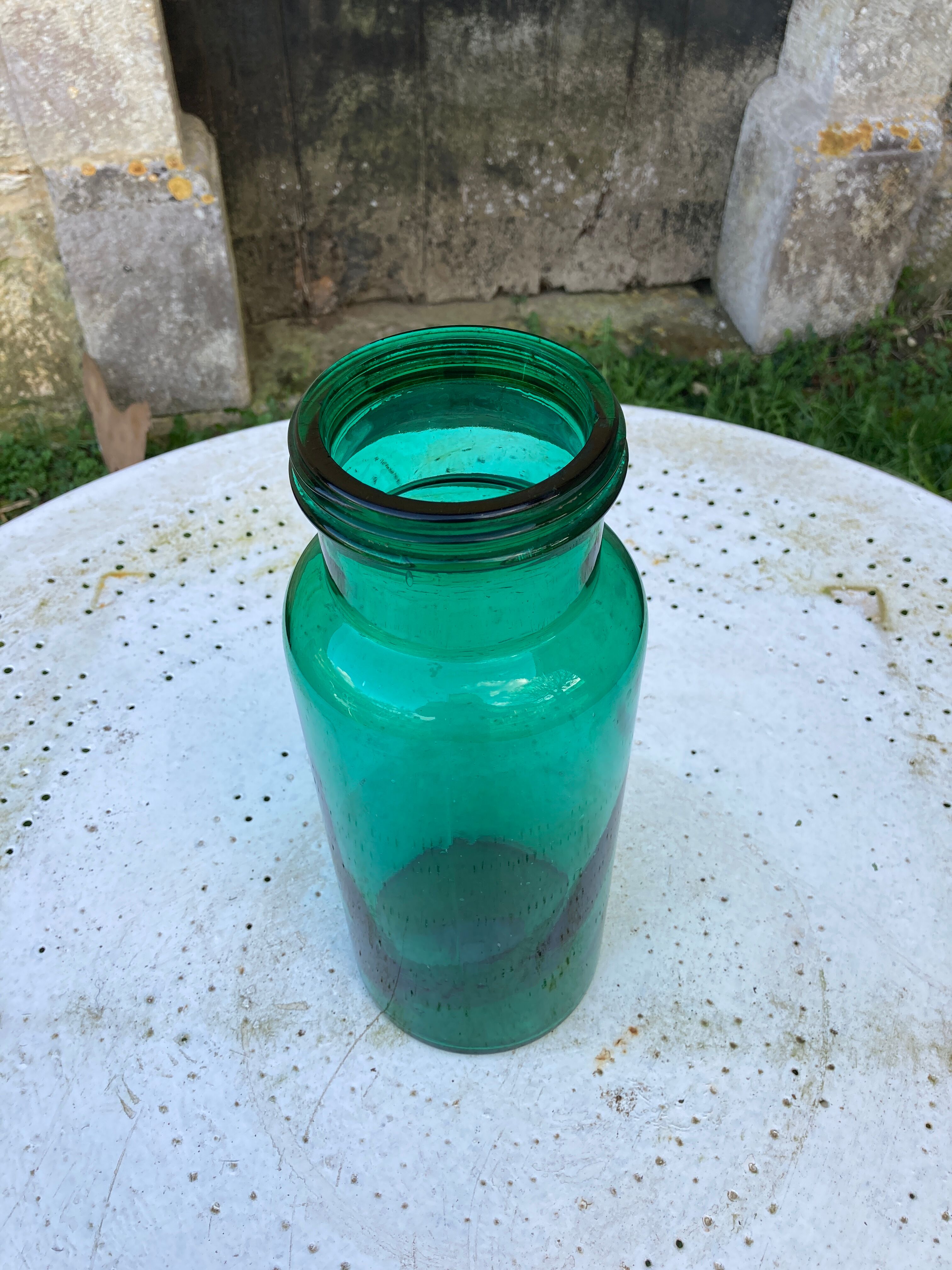Large green glass jar