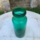 Large green glass jar