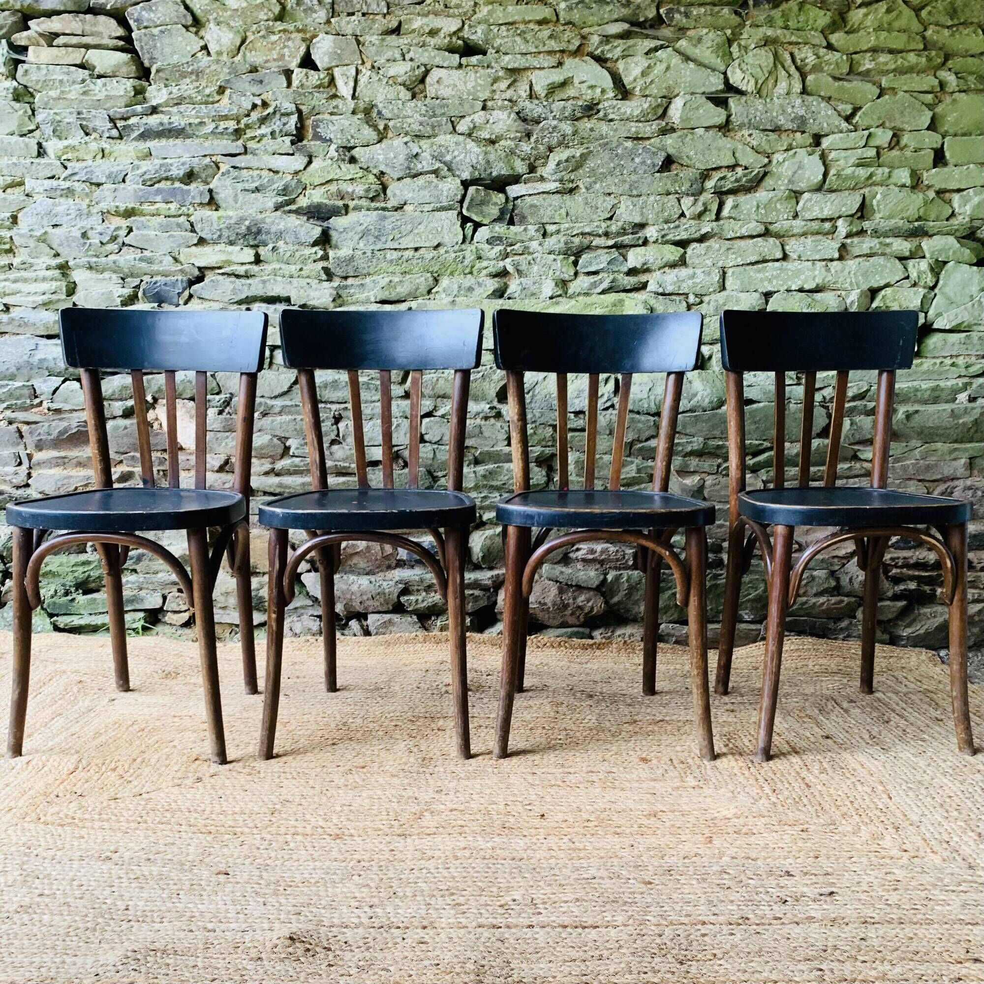 Set of four vintage bentwood bistro chairs.