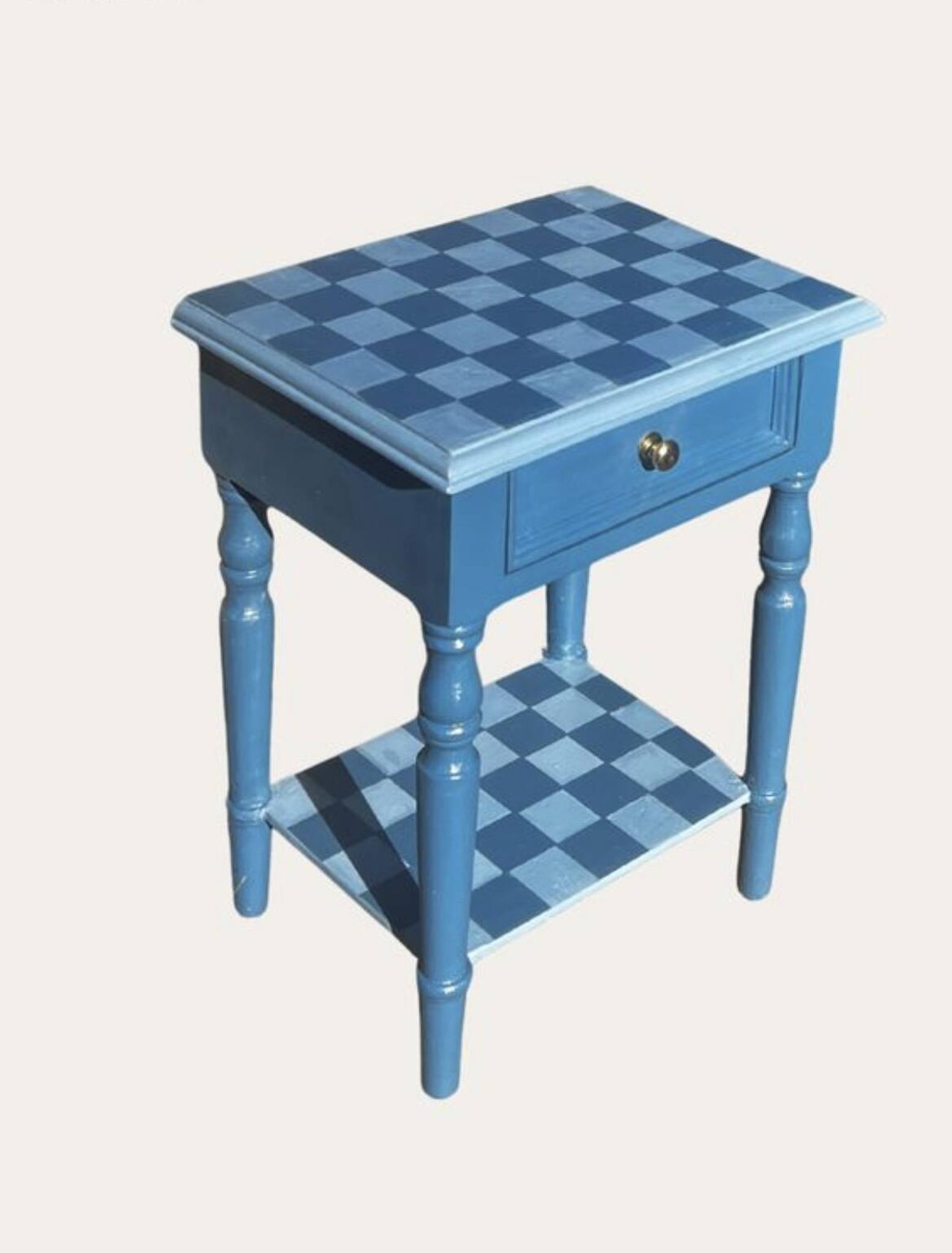 Blue checkered bedside table, neo-vintage style, turned legs.
