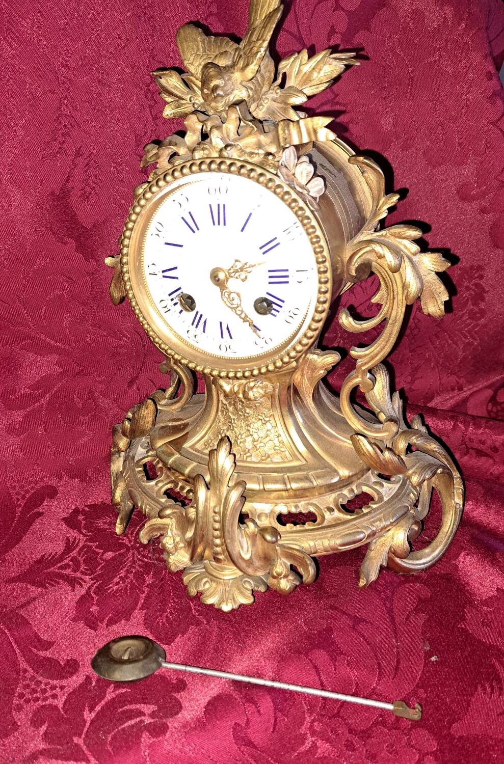Clock, cartel in gilded bronze. Louis XV