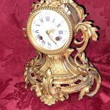 Clock, cartel in gilded bronze. Louis XV