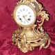 Clock, cartel in gilded bronze. Louis XV