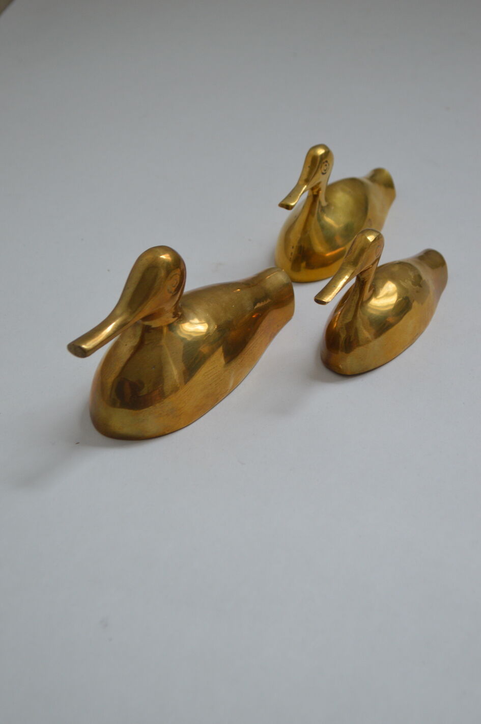 Suite of 3 brass ducks