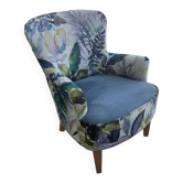 Contemporary ALC frog chair, reupholstered in watercolour floral fabric.