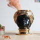 Black and gold Italian ceramic head vase signed Behreno