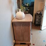 Low furniture refurbished in bleached wood