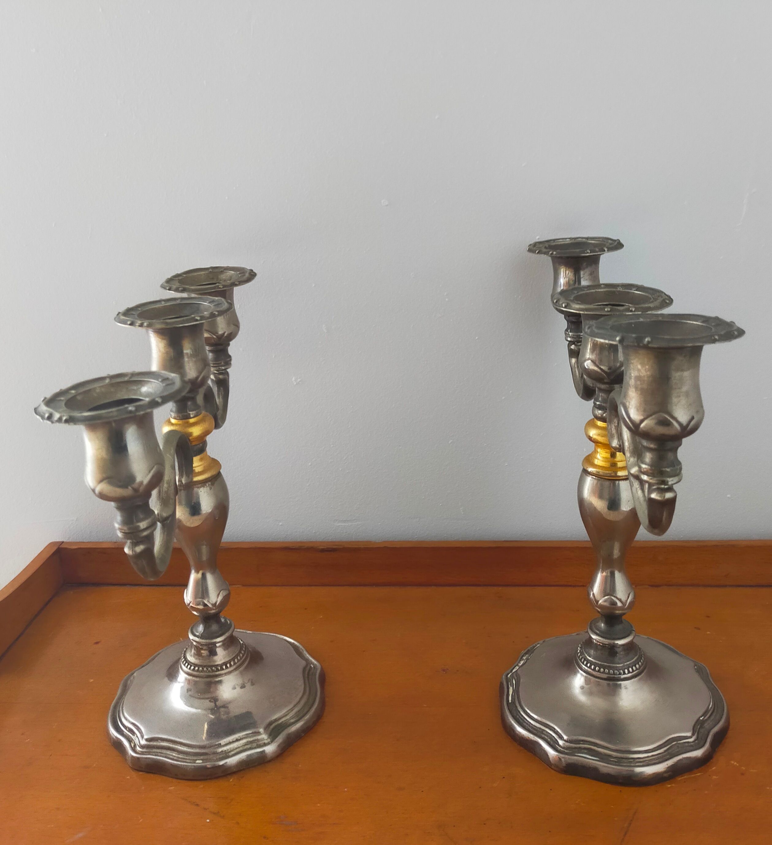 Pair of silver metal candlesticks