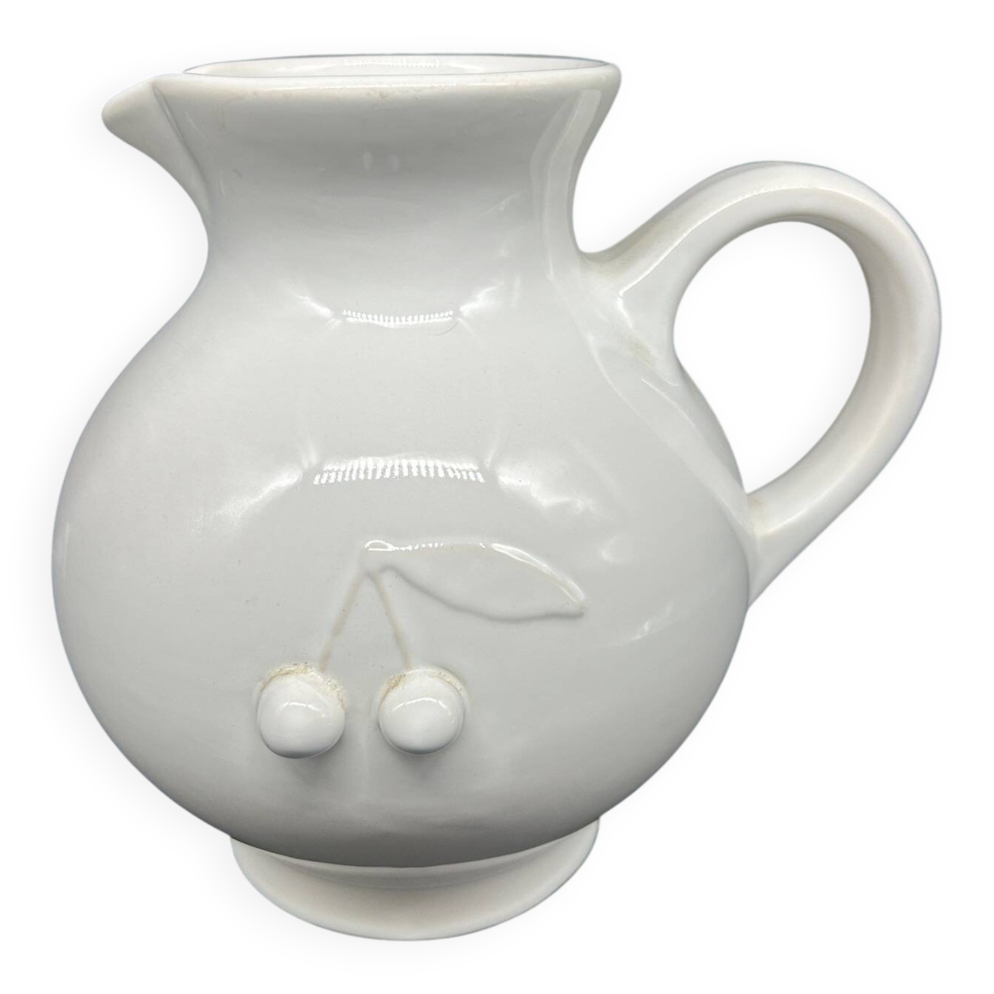 white ceramic cherry jug