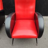 Pair of red and black faux leather armchairs