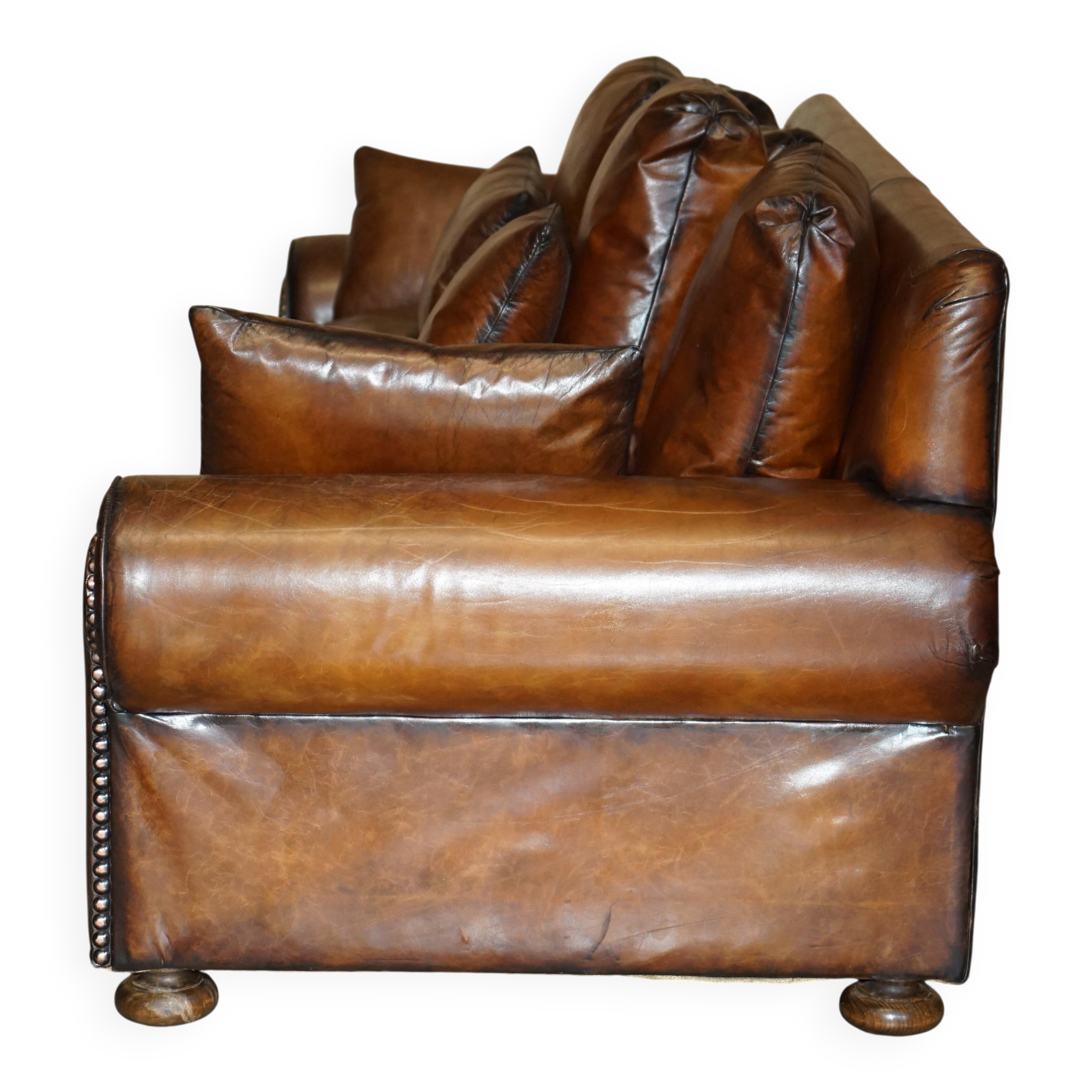 Pair of Ralph Lauren Jamaica club sofas restored in leather.