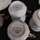 Series of five E. Bourgeois Paris porcelain coffee cups large deposit 1900