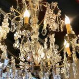 Large chandelier with tassels and old daggers