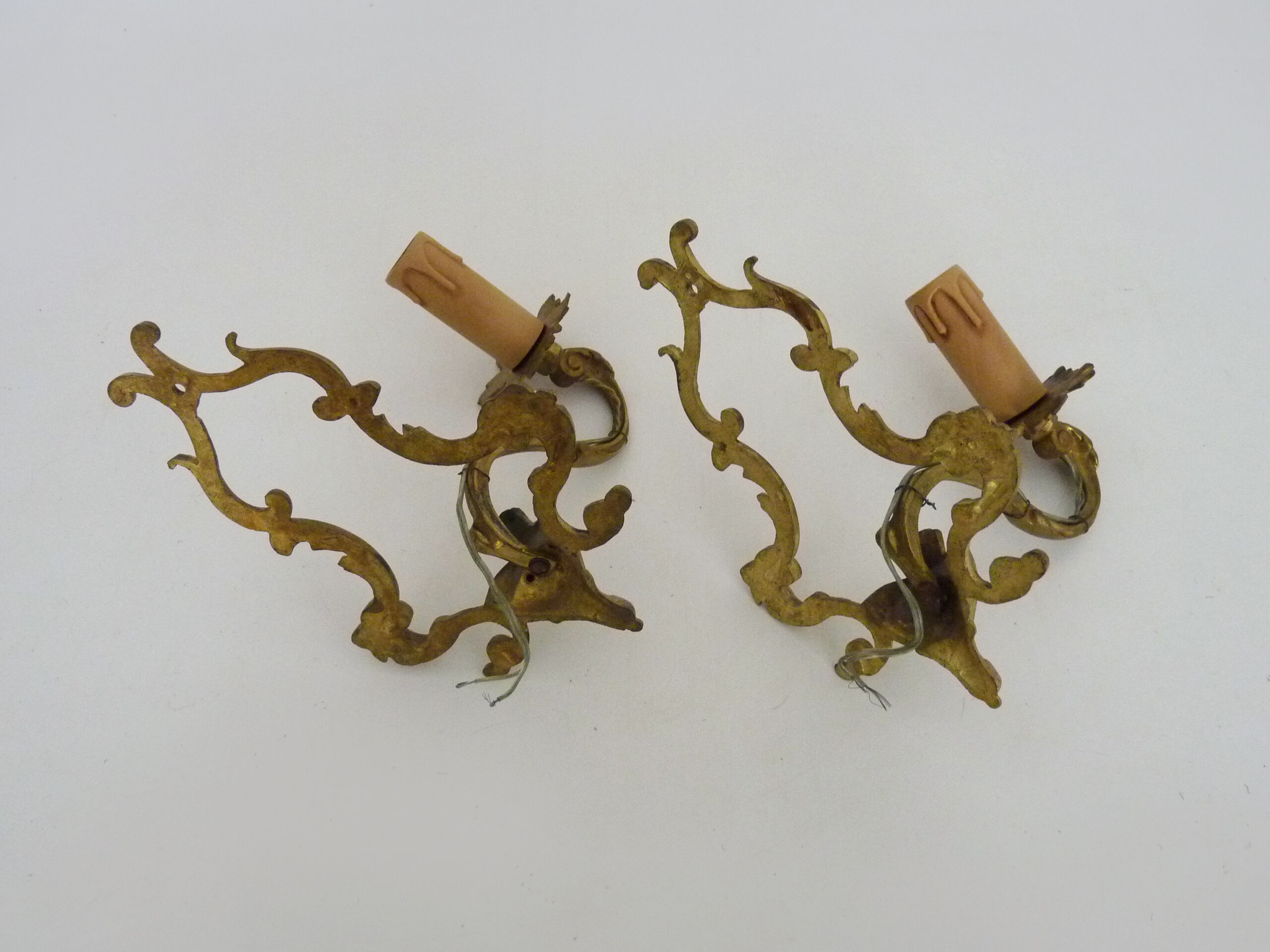 Vintage pair of bronze wall sconces from the 1950s and 60s.