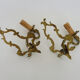 Vintage pair of bronze wall sconces from the 1950s and 60s.