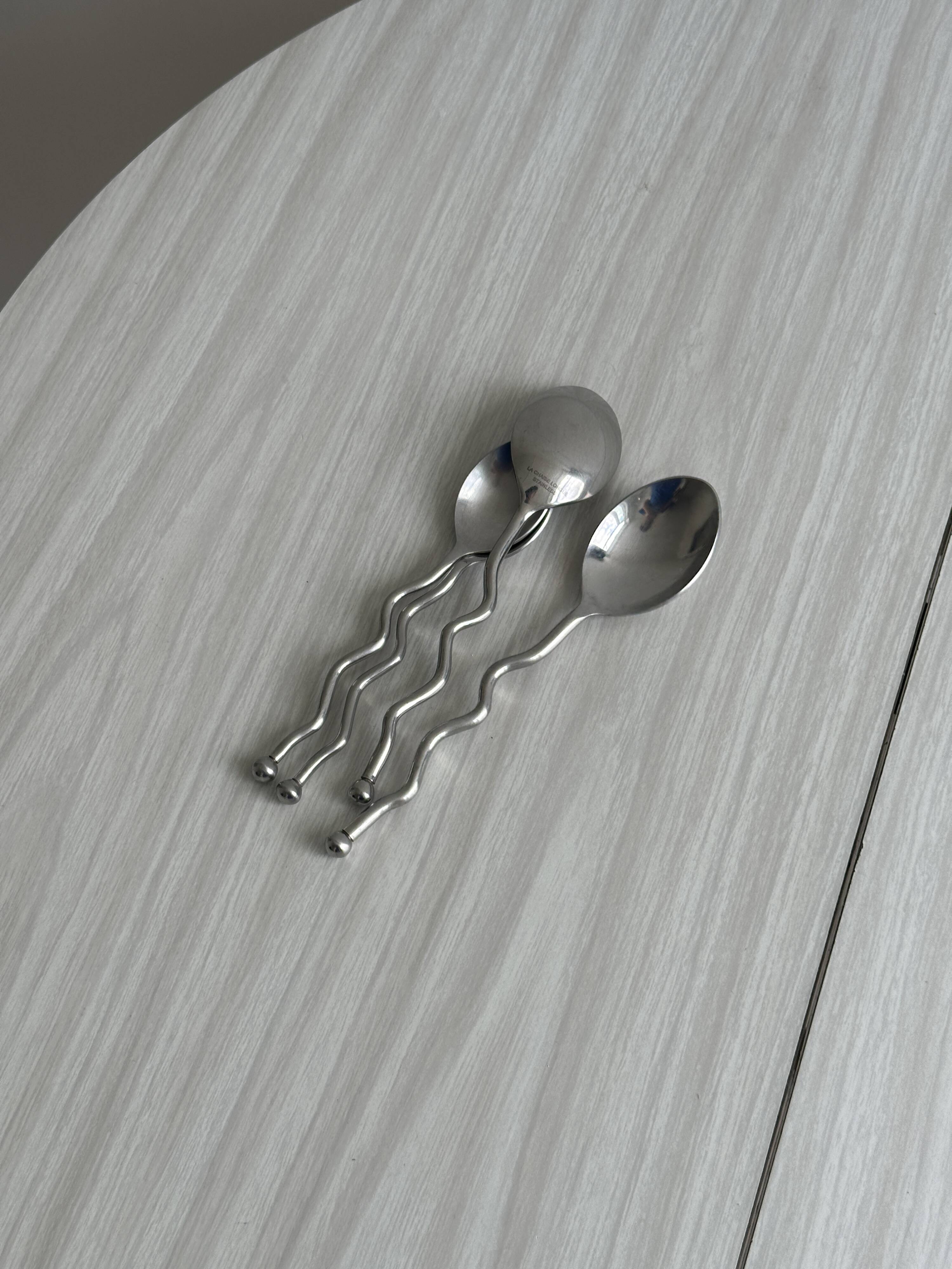 Set of 4 silver-plated metal spoons