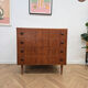 Danish teak commode from the 1960s, 4 drawers, tapered legs.