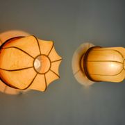 Pair of "cocoon" wall lights, resin and pine, Italy, 1970