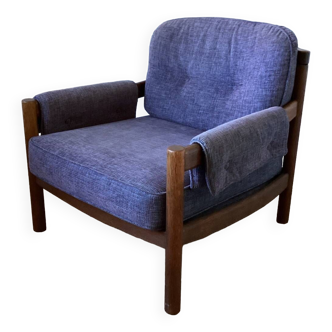 Vintage armchair in wood and blue velvet